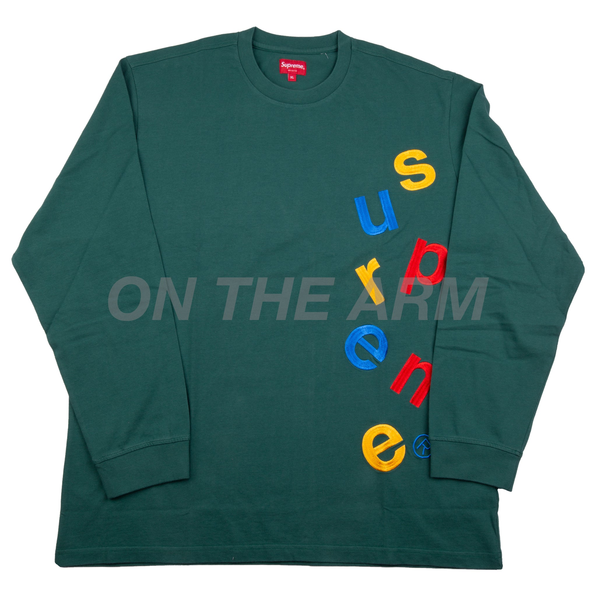 Supreme Dark Green Scatter Logo L/S – On The Arm